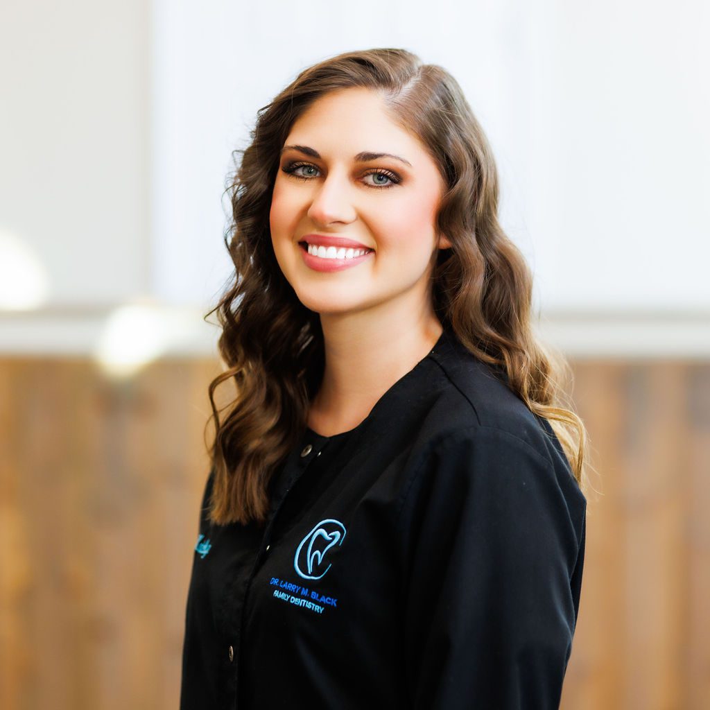 Smiling dental staff member at Valdosta GA dental office.